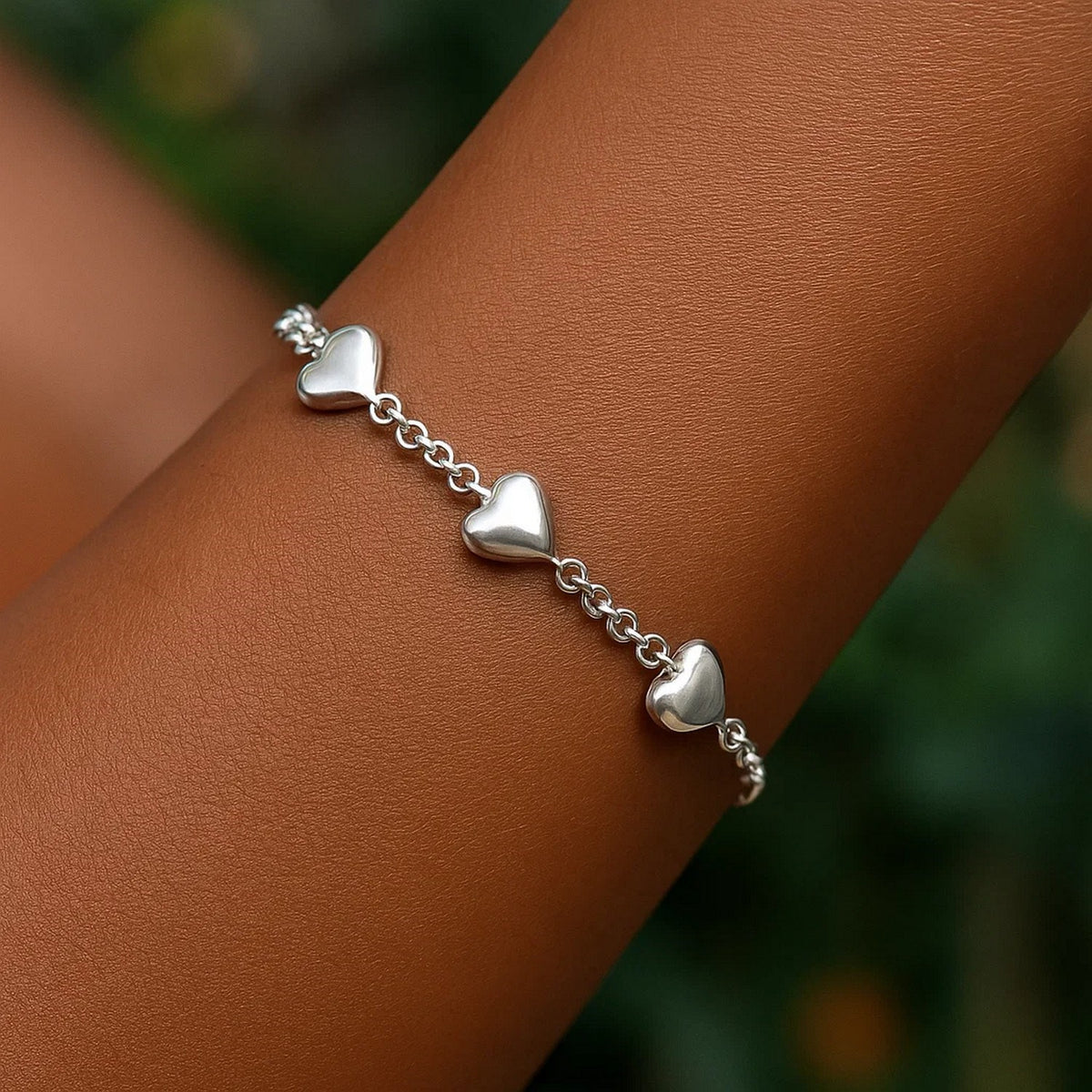 Sterling Silver Rhodium Plated Puffed Triple Heart Bracelet — view 5