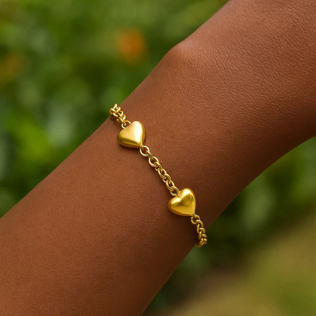 Sterling Silver Yellow Gold Plated Extra Puffed Triple Heart Bracelet — view 4